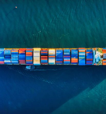 Container ship at sea, photographed from above
